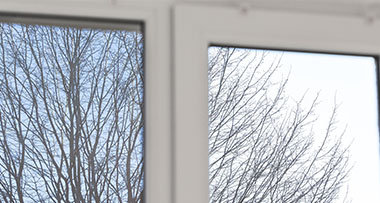 two windows, one with a tinted film and the other without a film