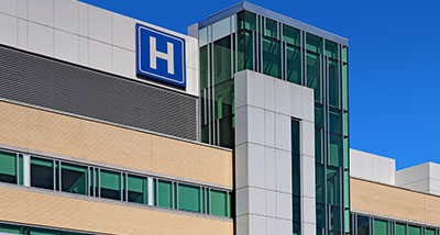 a hospital building with tinted windows